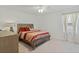 Bedroom featuring neutral carpet, ceiling fan, and a window at 1880 Bonser Rd, Minneola, FL 34715