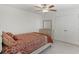 Bright bedroom featuring carpet, ceiling fan, and neutral paint color at 1880 Bonser Rd, Minneola, FL 34715