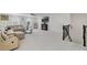Spacious living room featuring a comfortable sectional sofa, fireplace and ceiling fan at 1880 Bonser Rd, Minneola, FL 34715