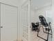 Office/flex room with French doors, featuring a desk area and equipment at 1880 Bonser Rd, Minneola, FL 34715