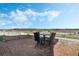Brick paved patio features a table with four chairs and a greenbelt view at 1880 Bonser Rd, Minneola, FL 34715