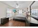 Bedroom features lots of natural light and a large mirror at 210 Vista Loop, Davenport, FL 33897