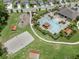 Aerial view of pool, playground, volleyball court, and community facilities at 219 Meghan Cir, Deland, FL 32724