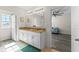 Bright bathroom featuring double sinks, granite countertops, and a large mirror at 219 Meghan Cir, Deland, FL 32724