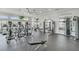 A well-equipped gym featuring various exercise machines, rubber flooring and a ceiling fan at 219 Meghan Cir, Deland, FL 32724