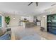 Bright and open layout with the living room flowing into the kitchen, featuring a large island and ample seating at 219 Meghan Cir, Deland, FL 32724