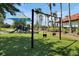 A community playground area features swings and play equipment for children at 219 Rosso Dr, Davenport, FL 33837