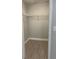Walk-in closet with shelving and sleek wood-look floors at 2207 Antigua Pl # 736, Kissimmee, FL 34741
