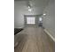 Open living space featuring modern floors and a ceiling fan at 2207 Antigua Pl # 736, Kissimmee, FL 34741