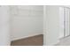 Walk-in closet with shelving, providing ample storage space at 2310 White Tail St, Davenport, FL 33837