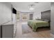 Spacious main bedroom with a bay window, walk in closet and neutral decor at 2466 R E Byrd Rd, Frostproof, FL 33843