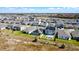 Aerial view of a residential neighborhood, featuring a mix of single-Gathering homes at 249 Hamlet Loop, Davenport, FL 33837