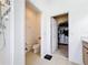Bright bathroom with a shower room, toilet room, and a walk-in closet at 249 Hamlet Loop, Davenport, FL 33837