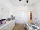 Bedroom featuring double closets, and a view into the hallway at 249 Hamlet Loop, Davenport, FL 33837