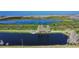 Scenic aerial view of the community pond and lush landscaping at 25 Lakeshore Blvd, St Cloud, FL 34769