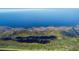 Aerial shot of a waterway and wetlands; a scenic view of the natural surroundings near the property at 25 Lakeshore Blvd, St Cloud, FL 34769
