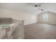 Spacious bonus room with carpet, ceiling fans and natural light at 25 Lakeshore Blvd, St Cloud, FL 34769