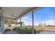 Charming front porch with ample space, a ceiling fan, and views of the street at 25 Lakeshore Blvd, St Cloud, FL 34769