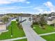 Beautiful home with well-manicured lawn, two-car garage, and appealing exterior design in quiet neighborhood at 2933 White Cedar Cir, Kissimmee, FL 34741