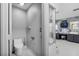 Modern bathroom featuring sleek fixtures, elegant marble tile, and a corner shower at 2933 White Cedar Cir, Kissimmee, FL 34741