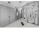 Contemporary bathroom with luxurious shower featuring body jets and multiple shower heads, and vanities at 2933 White Cedar Cir, Kissimmee, FL 34741