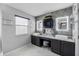 Beautifully designed bathroom with double sink vanity, stylish mirrors, and a relaxing atmosphere at 2933 White Cedar Cir, Kissimmee, FL 34741