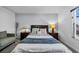 Well-lit bedroom featuring plush carpet, natural light, and tasteful decor at 2933 White Cedar Cir, Kissimmee, FL 34741