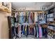 Spacious walk-in closet with ample storage and organization systems for clothes, shoes, and accessories at 2933 White Cedar Cir, Kissimmee, FL 34741