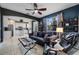 Open concept living room featuring a large kitchen, tile floors, a large window and stylish furniture at 2933 White Cedar Cir, Kissimmee, FL 34741