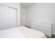 Well-lit bedroom showcasing a sleek, modern dresser and closet, providing ample storage space at 2984 Sanctuary Dr, Clermont, FL 34714