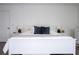 Comfortable bedroom showcasing a bed with side tables and hardwood style flooring at 2984 Sanctuary Dr, Clermont, FL 34714
