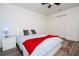 Nicely decorated bedroom with a bed and a sliding door closet, featuring a ceiling fan at 2984 Sanctuary Dr, Clermont, FL 34714