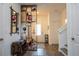Bright foyer featuring stylish decor, hardwood flooring, and a welcoming entrance at 2984 Sanctuary Dr, Clermont, FL 34714