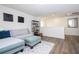 Upstairs living area featuring comfortable seating and decor, perfect for relaxing or entertaining at 2984 Sanctuary Dr, Clermont, FL 34714