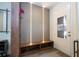 Functional mudroom with stylish wall accents, coat hooks, and a built-in bench at 2984 Sanctuary Dr, Clermont, FL 34714