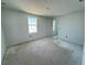A bright bedroom with natural light coming through the window ready to be personalized at 30113 Misty Pines Rd, Mount Dora, FL 32757