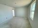 Bright bedroom with a large window providing natural light, creating a relaxing and inviting atmosphere at 30113 Misty Pines Rd, Mount Dora, FL 32757