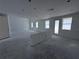 Open floor plan living room featuring bright light, tall ceilings and connections for appliances at 30113 Misty Pines Rd, Mount Dora, FL 32757