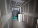 Unfinished bathroom with rough plumbing and space for a tub or shower at 30158 Rustic Mill St, Mount Dora, FL 32757