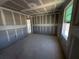 A bedroom with a view from the window ready for its new occupant's personal touch at 30158 Rustic Mill St, Mount Dora, FL 32757