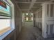 Unfinished interior view showing drywall and window with natural light in a new construction home at 30158 Rustic Mill St, Mount Dora, FL 32757