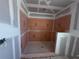 Unfinished shower with bright orange backer board ready for customization and tiling at 30158 Rustic Mill St, Mount Dora, FL 32757