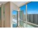 Balcony doors open up to a panoramic view of the city and landscape at 322 E Central Blvd # 1910, Orlando, FL 32801