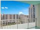 Wide angle view from a balcony featuring other highrise buildings and greenery at 322 E Central Blvd # 1910, Orlando, FL 32801