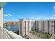 Beautiful view from a balcony showcasing a lake, buildings, and trees at 322 E Central Blvd # 1910, Orlando, FL 32801