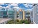 Modern condominium building in downtown setting with pool, lakeside location, city views, and landscaping at 322 E Central Blvd # 1910, Orlando, FL 32801