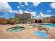 Hot tub and lounge chairs next to swimming pool with gazebo at 322 E Central Blvd # 1910, Orlando, FL 32801