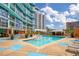 Beautiful swimming pool with city views, outdoor seating and poolside landscaping at 322 E Central Blvd # 1910, Orlando, FL 32801
