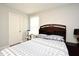Comfortable bedroom with a headboard and shelving and a window with blinds at 3237 Palatka St, Orlando, FL 32824