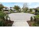 Outdoor paved community space with benches and landscaping at 3237 Palatka St, Orlando, FL 32824